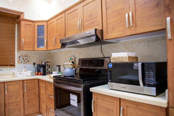 How can the use of compact appliances benefit a small, diet-friendly kitchen?